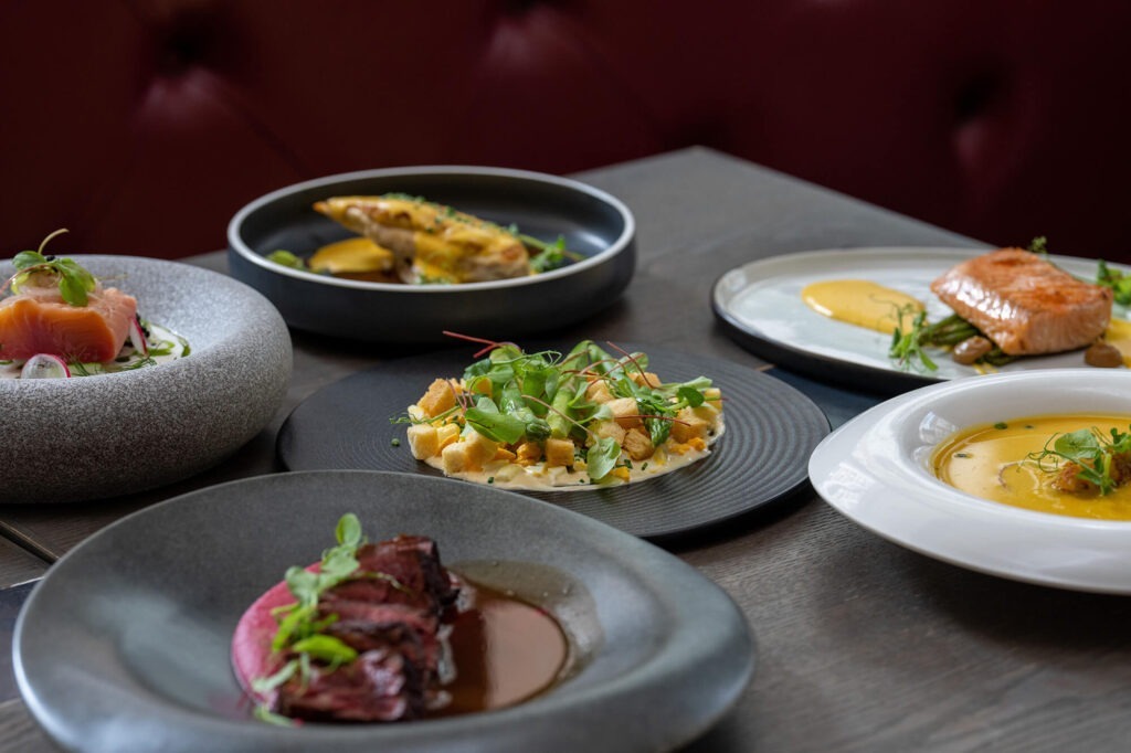 closeup-of-tasty-multiple-cooked-dishes-in-differe-2023-11-27-05-12-49-utc.jpg